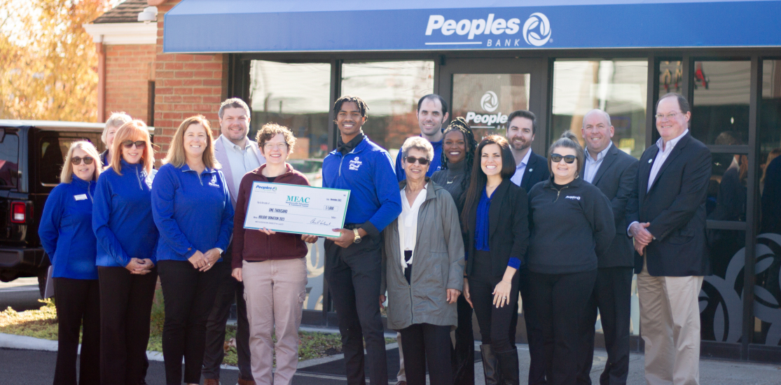 The Peoples Bank Foundation presents a check to the Madisonville Ohio Education and Assistance Center